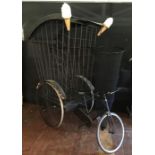 Child Catchers Bike with cage including ice cream cones, lollipops, child catching net. Full size