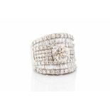 A diamond bombe cluster 18ct white gold ring, the central round brilliant-cut diamond approx 2.