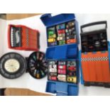 Five die cast vehicle carry cases, three Hot Wheels, two Matchbox. Vehicles included in some.