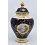 A Coalport hand painted potpourri vase, the central panel hand painted by EO Ball, depicting Loch