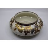A Royal Worcester globular rose bowl, decorated with birds, daisies, foliage in relief, with gilt