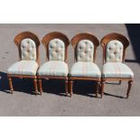 A set of four mid Victorian Gothic Revival oak dining chairs, circa 1880, arched shaped crest rails,