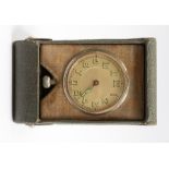 A Swiss made bedside watch, circa 1930/40's, in the style of a pocket watch, with a luminous dial