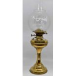 A 19th Century brass oil lamp with glass shade and funnel, miners lamp, plus a pair of 19th