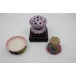A group of Royal Worcester including a pomander modelled as a posy of purple flowers, green mark,