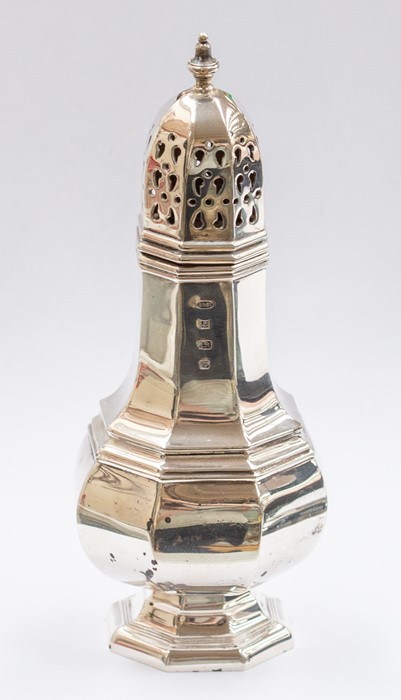 A Queen Anne style silver octagonal baluster shaped caster, byW I Broadway & Co, Birmingham 1971,
