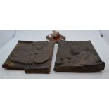 A pair of hardwood carvings, possibly originally part of a larger piece converted to wall
