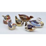 Six Royal Crown Derby paperweights to include a chaffinch, three wrens, duck and a grouse, gold