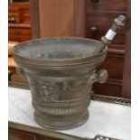 Pharmacy interest; an English 18th Century (?) bronze large mortar and pestle decorated with central