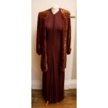 A Jean Muir from 1975, Brown Silk Jersey Long dress covered buttons down the front size 10, with a