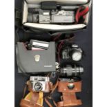 A collection of cameras cased circa 1960's to 1990's (Q)