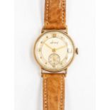 A 9ct gold Accurist  gents wristwatch, champagne dial, Roman numerals and dot markers, subsidiary
