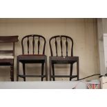 Three George III elm slatted back dining chairs, circa 1790, in the manner of Robert Adam, each with