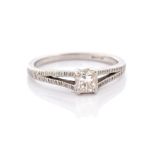 Tiffany & Co-  A  diamond and platinum 'Lucida' ring, by Tiffany & Co, the claw set square mixed cut