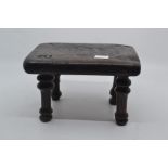A small early 19th Century children's stool in oak
