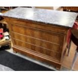A 19th Century Continental flame mahogany chest of drawers, in the Biedermeier style, having a