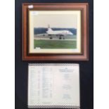 Concorde menu along with a framed photograph