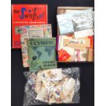 A collection of assorted stamps and cigarette card albums, various subjects