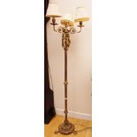 A circa mid 20th Century brass three branch standard lamp