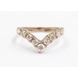 A diamond and 18ct gold  wishbone ring, set with nine brilliant cut diamonds, weighing a total