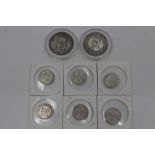 A collection silver, white metal and bronze coins, including eight white metal coins, a white