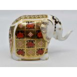 Three Royal Crown Derby paperweights to include a large Indian elephant, small Indian elephant and a