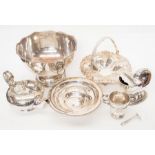 A collection of silver plated items including spoon warmer, punch bowl, two fruit bowls, teapot