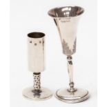 A modern Irish plain cylindrical silver tot glass, geometric stem on circular foot, by Royal Irish