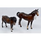 Two Beswick horses. Height of small horse approx 14cm, height of large horse approx 21.5cm.