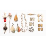 A collection of silver and unmarked white metal jewellery to include a coral, pearl and red paste