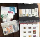 A stamp collection in 7 albums + loose