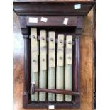 Early 20th Century wall hanging, musical pipes with mallet in mahogany