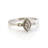 A diamond and platinum solitaire ring, by Emmy London, the centre marquise cut diamond measuring