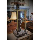 A Victorian Gothic Revival style lectern, the top reading rest raised on an octagonal column, with
