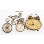 Two Edwardian silver pocket watches along with Albert chain and fob tassel, and a small German alarm