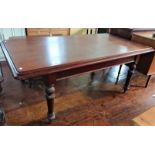 A Victorian mahogany dining table, raised on turned legs, 75cm high, 185cm wide, 98cm deep