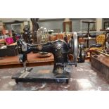 A Federation Family sewing machine, hand powered, number 291944 CWS