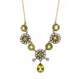 A vintage style peridot and pearl and 9ct gold necklace, comprising alternate collet set round