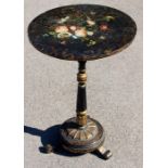 A Victorian Aesthetic pedestal occasional table, circa 1885, with a tilting top, inlaid with