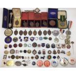 A collection of enamel badges, many with a Staffordshire theme. Along with 13 bronze school prize