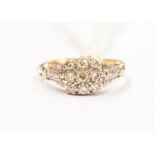 A diamond set 18ct gold and platinum cluster ring, circa 1930's, comprising a square setting set