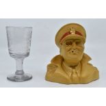 Military interest: A Royal Doulton ashtray figure of an army officer with printed 'Army Club' to