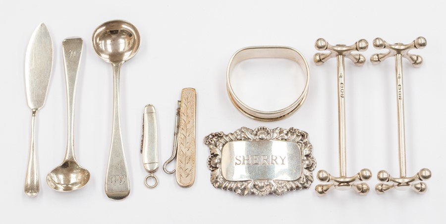 A collection of assorted silver tableware including: a pair of knife rests, London, 1890; sherry