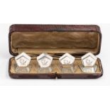 Asprey & Co., A set of four Edwardian silver hexagonal shaped menu holder, each engraved with a