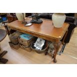 A George II style mahogany writing table, rectangular top with leather writing surface inlaid,