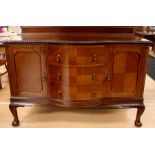 A mid 20th Century mahogany bow-fronted sideboard, the top with a back rail. moulded edge, two doors