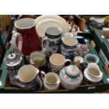 A collection of early to late 20th Century ceramics to include water jugs and pots, blue and white