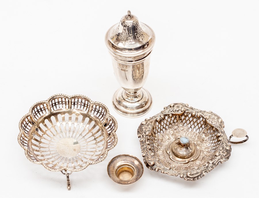 A collection of silver including sugar castor, by EH, Birmingham 1945; George V reticulated bonbon