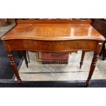 A mid Victorian mahogany serpentine fronted side table, circa 1880, having two frieze drawers,