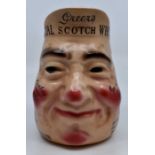 WM Greer & Co Glasgow Special Scotch Whisky character water jug. Signed to base J A Campbell &